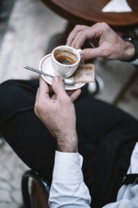 Photo by <a href="https://unsplash.com/@urbanriviera26?utm_source=unsplash&utm_medium=referral&utm_content=creditCopyText">Niko Samik</a> on <a href="https://unsplash.com/photos/man-holding-a-cup-of-espresso-with-a-cookie-YYNOlc2c8Nw?utm_source=unsplash&utm_medium=referral&utm_content=creditCopyText">Unsplash</a> 